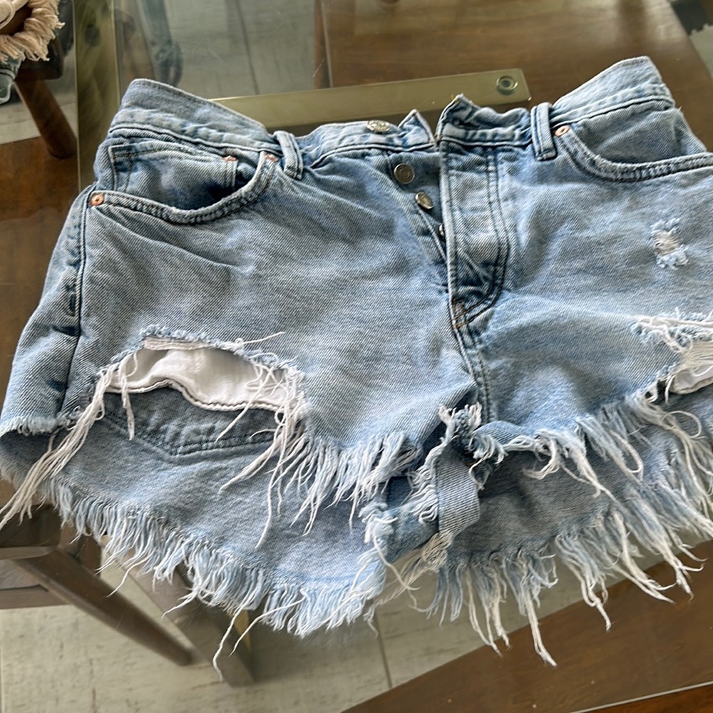 Free people size 29 fringed jean shorts ,